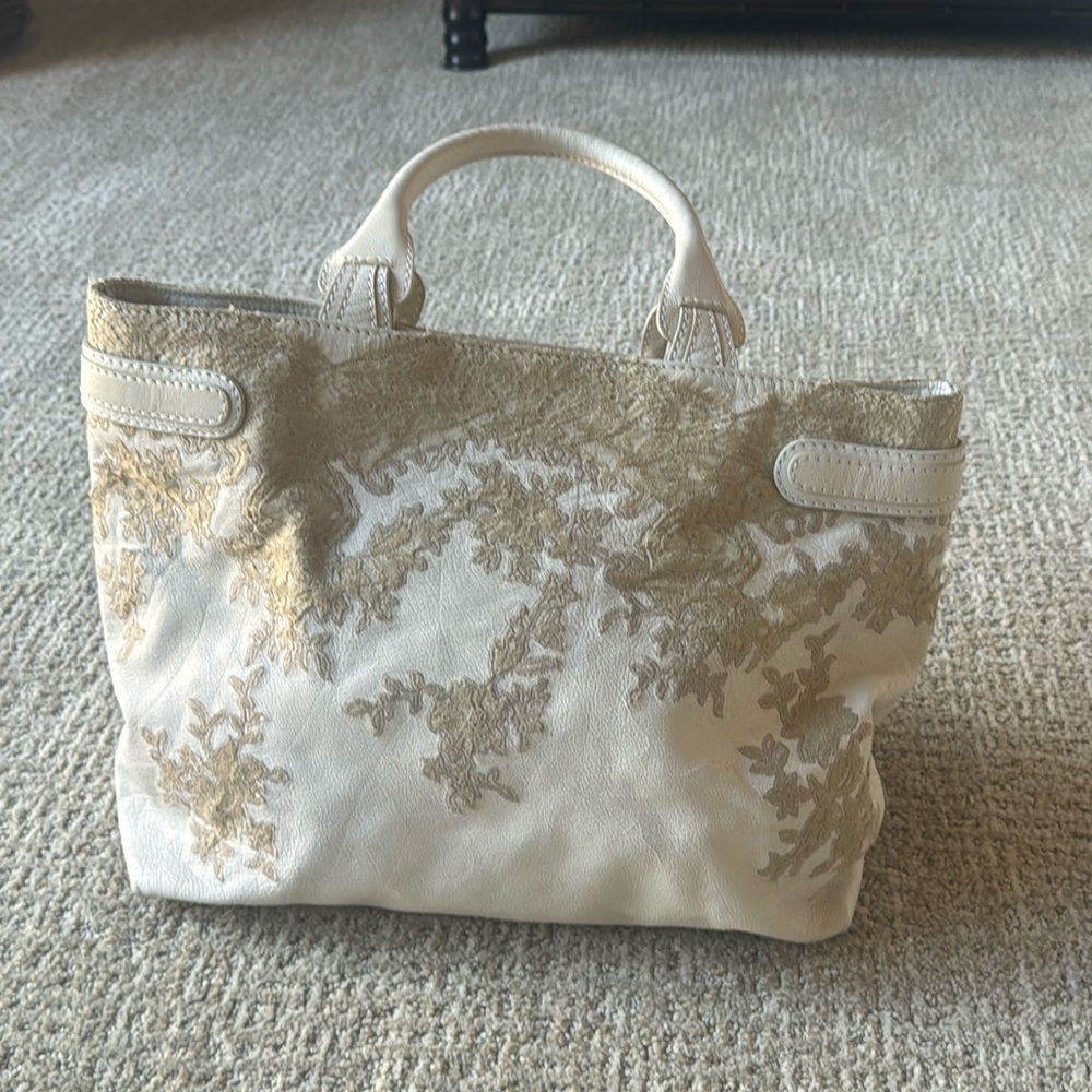 Red Valentino lace appliqué tote